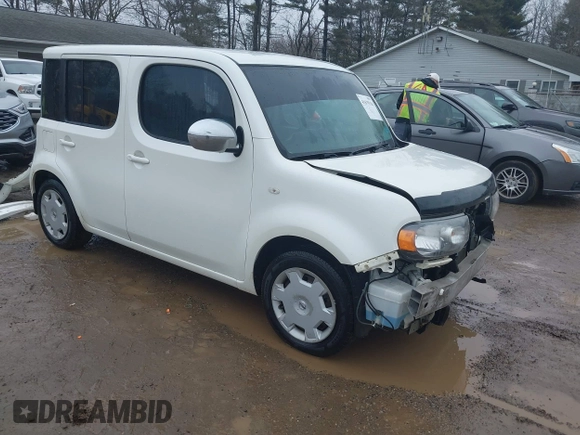 2012 Nissan Cube S z VIN JN8AZ2KR4CT255582, wystawiony jako IAAI lot #41679316 z przebiegiem 244 794 mil mil oraz . Historia ofert i sprzedaży dostępna na DreamBid. Obrazek 1.