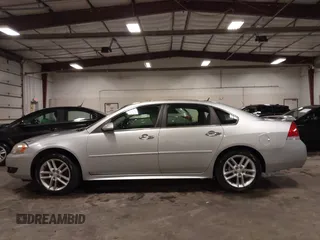 2014 Chevrolet Impala LTZ with VIN 2G1WC5E3XE1157931, listed as a IAAI auction lot 42688907 with 119,985 mi miles and . Bid and sale history available at DreamBid. Image 14.