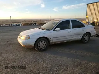 1999 Mercury Mystique GS z VIN 1MEFM6532XK638087, wystawiony jako Copart lot #85269414 z przebiegiem 192 506 mil mil oraz Szkody całkowita. Historia ofert i sprzedaży dostępna na DreamBid. Obrazek 10.