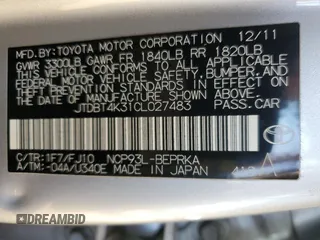 2012 Toyota Yaris z VIN JTDBT4K31CL027483, wystawiony jako Copart lot #59919165 z przebiegiem 81 298 mil mil oraz Szkoda całkowita • Salvage title. Historia ofert i sprzedaży dostępna na DreamBid. Obrazek 12.