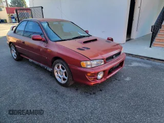 2000 Subaru Impreza RS with VIN JF1GM6754YG403253, listed as a Copart auction lot 51190815 with 146,476 mi miles and Salvage title. Bid and sale history available at DreamBid. Image 1.