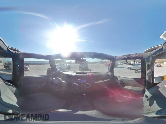2015 Jeep Wrangler Sahara with VIN 1C4AJWBG5FL733795, listed as a Copart auction lot 61998255 with 86,655 mi miles and Salvage title. Bid and sale history available at DreamBid. Image 14.