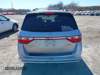 2012 Honda Odyssey Touring with VIN 5FNRL5H93CB042392, listed as a IAAI auction lot 41859533 with 169,141 mi miles. Bid and sale history available at carsss.com. Image 16.