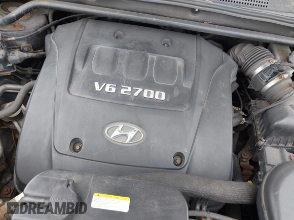 2007 Hyundai Tucson SE with VIN KM8JN12D77U667867, listed as a IAAI auction lot 42082092 with 240,911 mi miles. Bid and sale history available at carsss.com. Image 10.