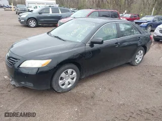 2007 Toyota Camry CE with VIN 4T1BE46K57U707992, listed as a IAAI auction lot 41927764 with 317,088 mi miles. Bid and sale history available at carsss.com. Image 2.