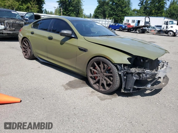 2017 BMW M6 z VIN WBS6E9C53HG437414, wystawiony jako Copart lot #61141685 z przebiegiem 89 893 mil mil oraz Szkoda całkowita • Salvage title. Historia ofert i sprzedaży dostępna na DreamBid. Obrazek 4.