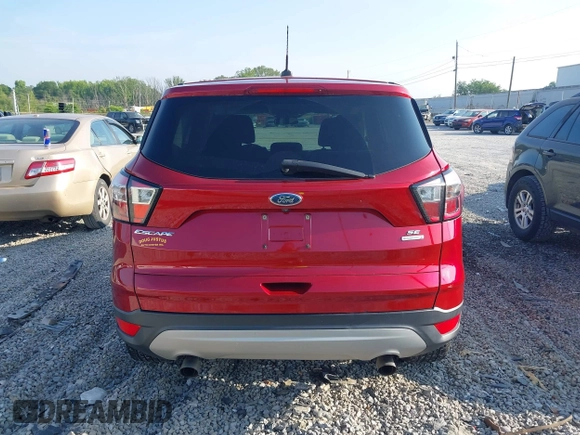 2017 Ford Escape SE z VIN 1FMCU0GD9HUF01849, wystawiony jako IAAI lot #42410230 z przebiegiem 177 423 mil mil oraz . Historia ofert i sprzedaży dostępna na DreamBid. Obrazek 16.