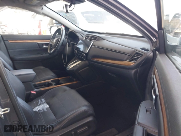 2020 Honda CR-V Touring z VIN 7FART6H91LE000684, wystawiony jako IAAI lot #42504731 z przebiegiem 49 100 mil mil oraz . Historia ofert i sprzedaży dostępna na DreamBid. Obrazek 5.