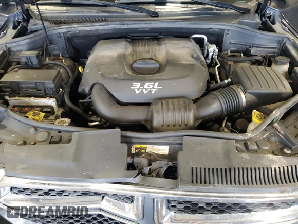 2013 Dodge Durango Crew with VIN 1C4RDJDG2DC663518, listed as a Copart auction lot 62736515 with 226,720 mi miles and Salvage title. Bid and sale history available at DreamBid. Image 12.
