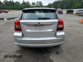 2010 Dodge Caliber SXT z VIN 1B3CB4HAXAD605621, wystawiony jako Copart lot #59040275 z przebiegiem 191 401 mil mil oraz Szkoda całkowita • Salvage title. Historia ofert i sprzedaży dostępna na DreamBid. Obrazek 6.