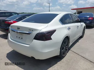 2013 Nissan Altima SL with VIN 1N4BL3AP4DC236710, listed as a IAAI auction lot 42674095 with 212,483 mi miles and . Bid and sale history available at DreamBid. Image 4.