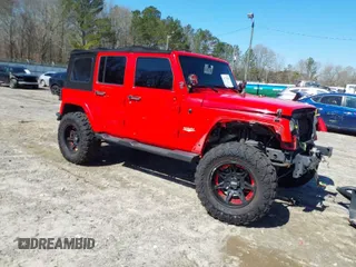 2015 Jeep Wrangler Unlimited Sahara with VIN 1C4BJWEG1FL748732, listed as a IAAI auction lot 41779308 with 109,986 mi miles. Bid and sale history available at carsss.com. Image 1.
