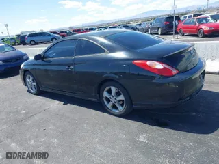 2004 Toyota Camry Solara SE with VIN 4T1CA38P24U015266, listed as a IAAI auction lot 41976105 with 221,942 mi miles. Bid and sale history available at carsss.com. Image 3.
