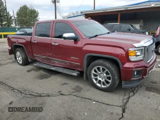 2015 GMC Sierra 1500 Denali with VIN 3GTU2WEC0FG109273, listed as a Copart auction lot 52823815 with 102,079 mi miles and Salvage Title. Bid and sale history available at carsss.com. Image 4.