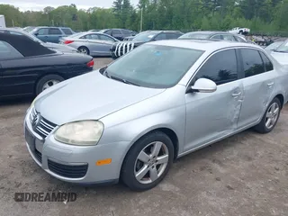 2009 Volkswagen Jetta SE with VIN 3VWRZ81K79M013704, listed as a IAAI auction lot 42259656 with 197,600 mi miles and . Bid and sale history available at DreamBid. Image 2.