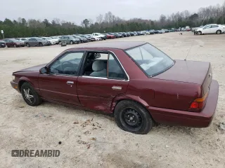1992 Nissan Stanza GXE z VIN JN1FU21P3NX909177, wystawiony jako Copart lot #83811334 z przebiegiem 67 101 mil mil oraz Szkody całkowita. Historia ofert i sprzedaży dostępna na DreamBid. Obrazek 2.