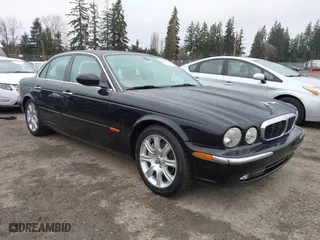 2004 Jaguar XJ with VIN SAJWA71C94SG29019, listed as a IAAI auction lot 41664978 with 133,546 mi miles. Bid and sale history available at carsss.com. Image 1.