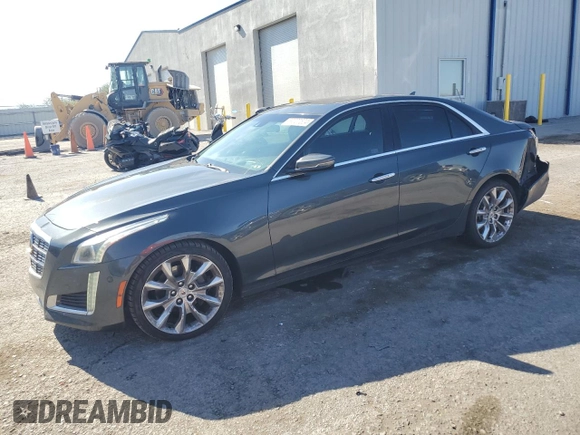 2014 Cadillac CTS Premium AWD with VIN 1G6AZ5S34E0123356, listed as a Copart auction lot 69327504 with 136,292 mi miles and Salvage Title. Bid and sale history available at DreamBid. Image 1.