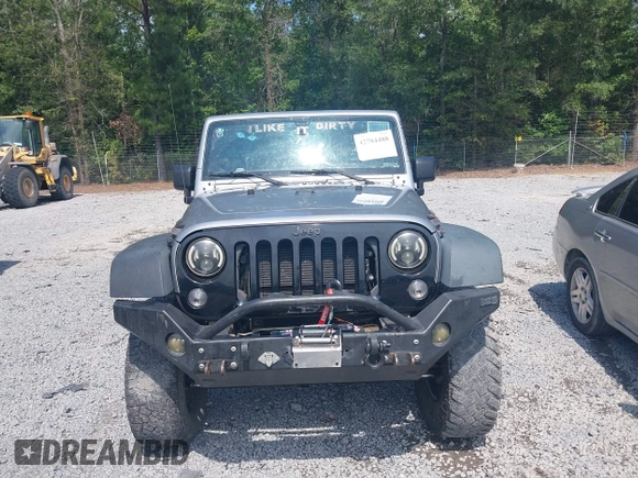 2015 Jeep Wrangler Freedom Edition with VIN 1C4AJWAG4FL589769, listed as a IAAI auction lot 42704488 with 194,414 mi miles and . Bid and sale history available at DreamBid. Image 12.