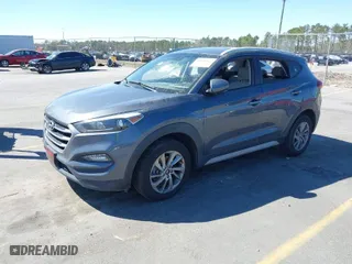 2018 Hyundai Tucson SEL with VIN KM8J3CA48JU718402, listed as a IAAI auction lot 41810363 with 218,853 mi miles. Bid and sale history available at carsss.com. Image 2.