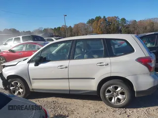 2014 Subaru Forester 2.5i with VIN JF2SJAAC4EG414600, listed as a IAAI auction lot 41006289 with 128,611 mi miles. Bid and sale history available at carsss.com. Image 14.