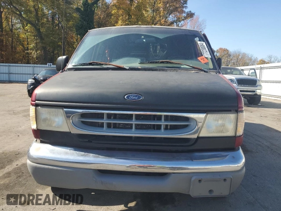 1999 Ford Econoline Cargo with VIN 1FDRE14W1XHB36383, listed as a Copart auction lot 77230084 with 222,420 mi miles and Salvage Title. Bid and sale history available at carsss.com. Image 5.