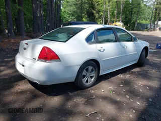2014 Chevrolet Impala LS z VIN 2G1WA5E39E1176332, wystawiony jako IAAI lot #42233713 z przebiegiem 133 355 mil mil oraz . Historia ofert i sprzedaży dostępna na DreamBid. Obrazek 4.