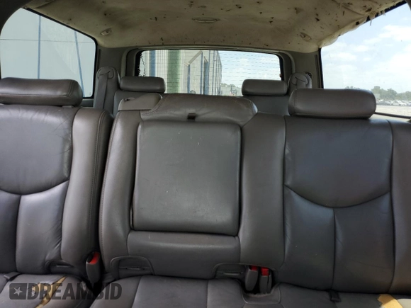 2005 Chevrolet Suburban LT z VIN 3GNEC16Z15G280353, wystawiony jako Copart lot #53974785 z przebiegiem 389 849 mil mil oraz Nie do naprawy. Historia ofert i sprzedaży dostępna na DreamBid. Obrazek 10.