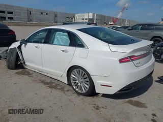 2016 Lincoln MKZ z VIN 3LN6L2G98GR618707, wystawiony jako IAAI lot #42569269 z przebiegiem 159 545 mil mil oraz . Historia ofert i sprzedaży dostępna na DreamBid. Obrazek 3.