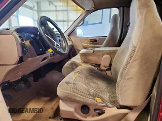 1999 Ford F-150 с VIN 1FTRX17W2XKB38205, выставлен на аукционе Copart как лот 63732045 с пробегом Не указан миль и Списание • Salvage title. История ставок и продаж доступна на DreamBid. Изображение 7.