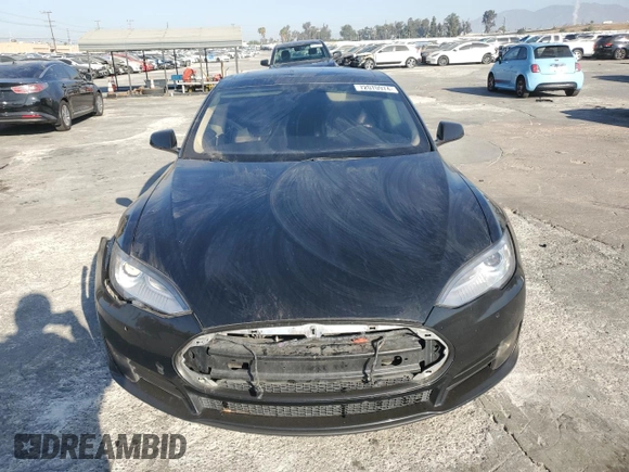 2014 Tesla Model S 60 с VIN 5YJSA1H16EFP40654, выставлен на аукционе Copart как лот 72070974 с пробегом Не указан миль и Списание • Salvage title. История ставок и продаж доступна на DreamBid. Изображение 5.