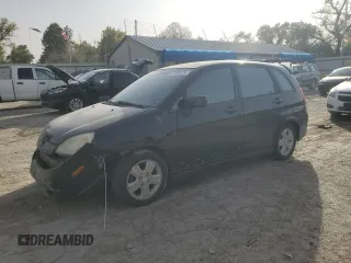 2003 Suzuki Aerio SX z VIN JS2RC41H135205642, wystawiony jako Copart lot #77690224 z przebiegiem 161 414 mil mil oraz Szkoda całkowita • Salvage title. Historia ofert i sprzedaży dostępna na DreamBid. Obrazek 1.