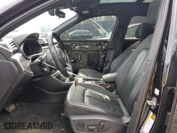 2020 Audi Q3 Premium with VIN WA1AECF30L1025756, listed as a Copart auction lot 50295125 with 77,389 mi miles and Salvage title. Bid and sale history available at DreamBid. Image 7.