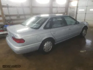 1994 Ford Taurus GL with VIN 1FALP52U5RG255078, listed as a Copart auction lot 86631304 with 86,662 mi miles and Salvage Title. Bid and sale history available at carsss.com. Image 3.