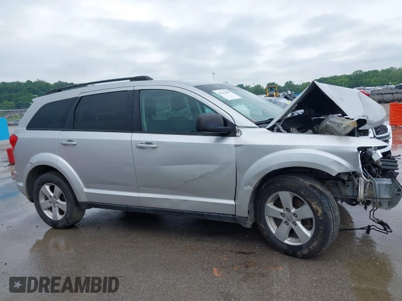2013 Dodge Journey Canada Value z VIN 3C4PDCABXDT563439, wystawiony jako IAAI lot #42227899 z przebiegiem 213 199 mil mil oraz . Historia ofert i sprzedaży dostępna na DreamBid. Obrazek 12.