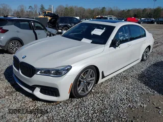 2017 BMW 7 Series 750i with VIN WBA7F0C34HGM21738, listed as a IAAI auction lot 41772933 with 62,923 mi miles and . Bid and sale history available at DreamBid. Image 17.