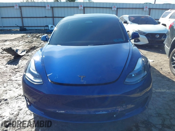2023 Tesla Model 3 Long Range with VIN 5YJ3E1EB0PF688172, listed as a IAAI auction lot 41411580 with 21,125 mi miles and . Bid and sale history available at DreamBid. Image 6.