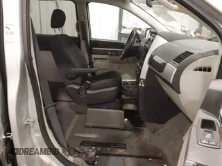 2010 Dodge Grand Caravan SXT with VIN 2D4RN5D15AR261319, listed as a IAAI auction lot 41877022 with 142,292 mi miles and . Bid and sale history available at DreamBid. Image 5.