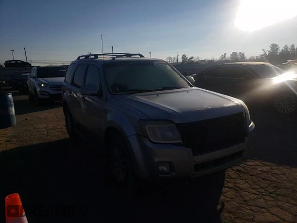 2008 Mercury Mariner Premier z VIN 4M2CU97108KJ43593, wystawiony jako Copart lot #62006105 z przebiegiem 124 233 mil mil oraz Szkoda całkowita • Salvage title. Historia ofert i sprzedaży dostępna na DreamBid. Obrazek 11.