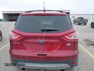 2014 Ford Escape SE with VIN 1FMCU9G90EUD89356, listed as a IAAI auction lot 41841229 with 148,997 mi miles and . Bid and sale history available at carsss.com. Image 16.