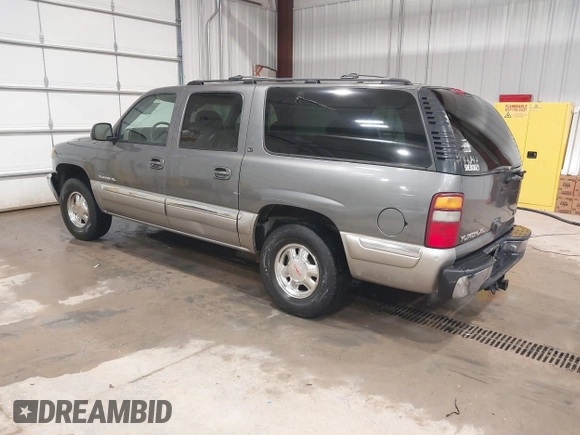 2000 GMC Yukon XL SLT with VIN 3GKFK16T7YG142515, listed as a IAAI auction lot 42044906 with 271,911 mi miles. Bid and sale history available at carsss.com. Image 3.