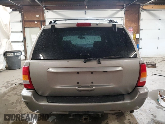 2001 Jeep Grand Cherokee Limited with VIN 1J4GW58N91C664611, listed as a Copart auction lot 53330755 with 212,479 mi miles and Salvage Title. Bid and sale history available at carsss.com. Image 6.