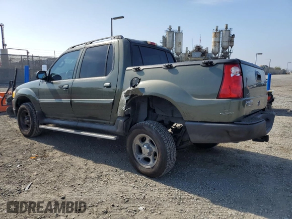2004 Ford Explorer Sport Trac XLS with VIN 1FMZU67K64UA39174, listed as a Copart auction lot 61035465 with 196,912 mi miles and Salvage title. Bid and sale history available at DreamBid. Image 2.