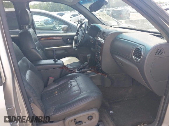 2004 GMC Envoy SLT with VIN 1GKDS13S742230325, listed as a IAAI auction lot 42385113 with 177,989 mi miles and . Bid and sale history available at DreamBid. Image 5.