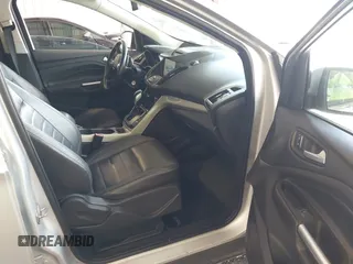 2013 Ford Escape SEL z VIN 1FMCU9HX0DUB99150, wystawiony jako IAAI lot #42812971 z przebiegiem 212 298 mil mil oraz . Historia ofert i sprzedaży dostępna na DreamBid. Obrazek 5.