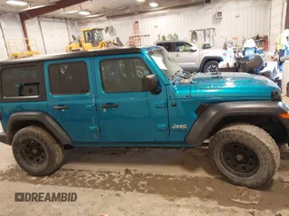 2019 Jeep Wrangler Unlimited Sport Altitude with VIN 1C4HJXDG0KW617379, listed as a IAAI auction lot 42005517 with 91,296 mi miles and . Bid and sale history available at DreamBid. Image 13.