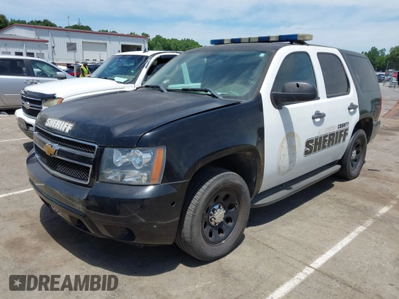 2013 Chevrolet Tahoe Commercial z VIN 1GNLC2E00DR337995, wystawiony jako IAAI lot #42213635 z przebiegiem Nie podano mil oraz . Historia ofert i sprzedaży dostępna na DreamBid. Obrazek 16.