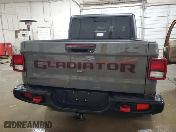 2021 Jeep Gladiator Rubicon с VIN 1C6JJTBM5ML541530, выставлен на аукционе Copart как лот 82661554 с пробегом 55 539 миль миль и Списание • Salvage title. История ставок и продаж доступна на DreamBid. Изображение 6.