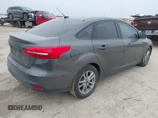 2018 Ford Focus SE with VIN 1FADP3F29JL269000, listed as a IAAI auction lot 41630271 with 75,073 mi miles. Bid and sale history available at carsss.com. Image 4.