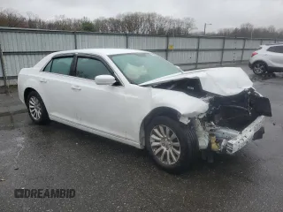 2014 Chrysler 300 with VIN 2C3CCAAG3EH182984, listed as a Copart auction lot 51958655 with 207,595 mi miles and Salvage Title. Bid and sale history available at DreamBid. Image 4.